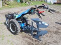 Pług jednoskibowy odwracalny do ciągników jednoosiowych - ciągnik BCS 740 z kołami 12 oraz obciążnikami 2 x 34kg